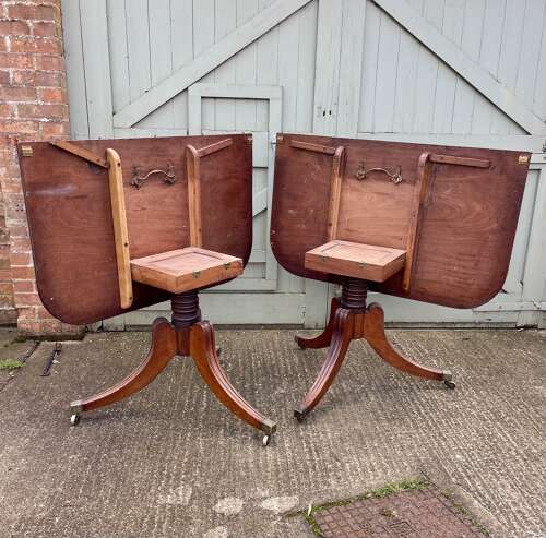 A 19th century twin pillar dining table