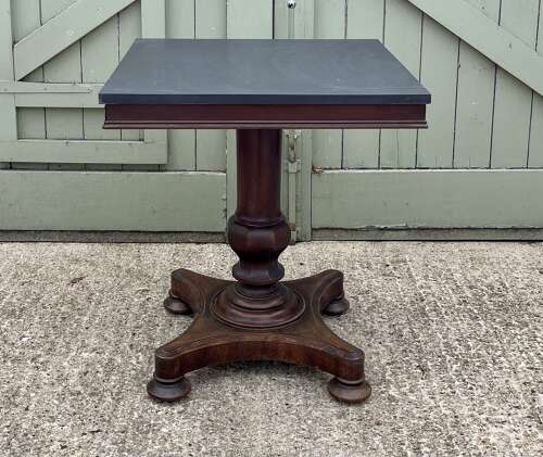 A 19th century centre table attributed to Holland and Sons