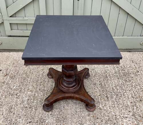 A 19th century centre table attributed to Holland and Sons