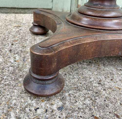 A 19th century centre table attributed to Holland and Sons