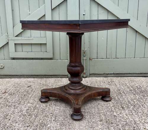 A 19th century centre table attributed to Holland and Sons
