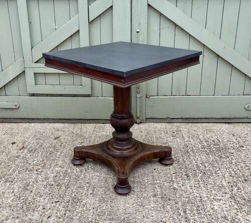 A 19th century centre table attributed to Holland and Sons