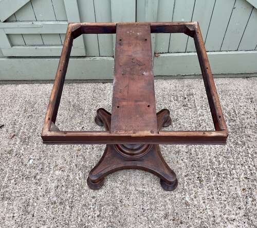 A 19th century centre table attributed to Holland and Sons