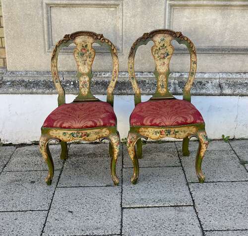 A pair of antique Venetian chairs