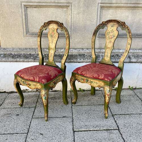 A pair of antique Venetian chairs