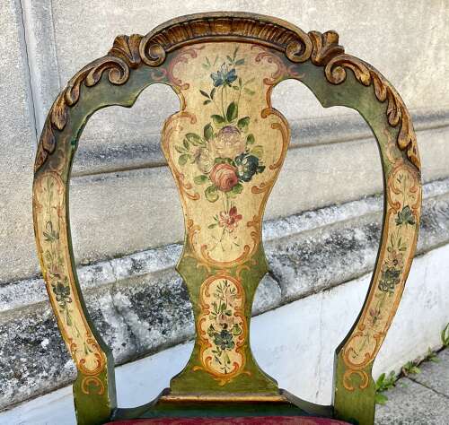 A pair of antique Venetian chairs