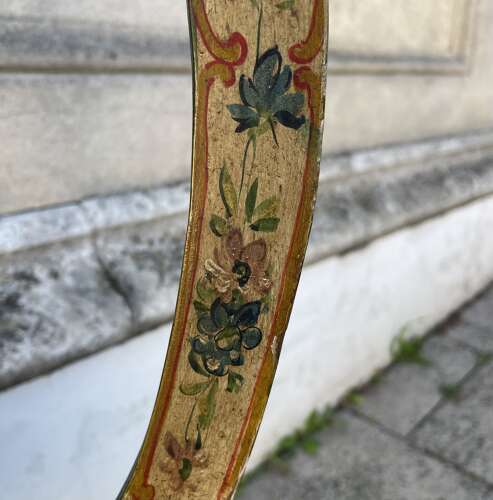 A pair of antique Venetian chairs