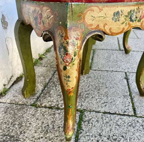 A pair of antique Venetian chairs