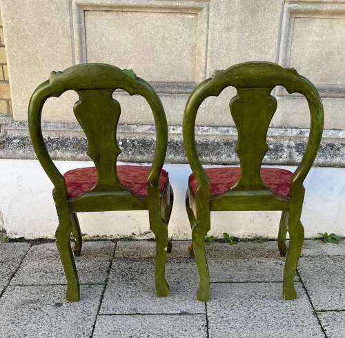 A pair of antique Venetian chairs