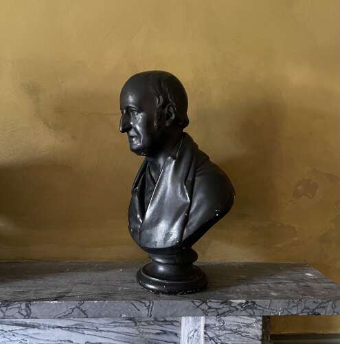 A pair of 19th century plaster library busts