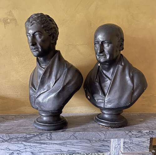A pair of 19th century plaster library busts