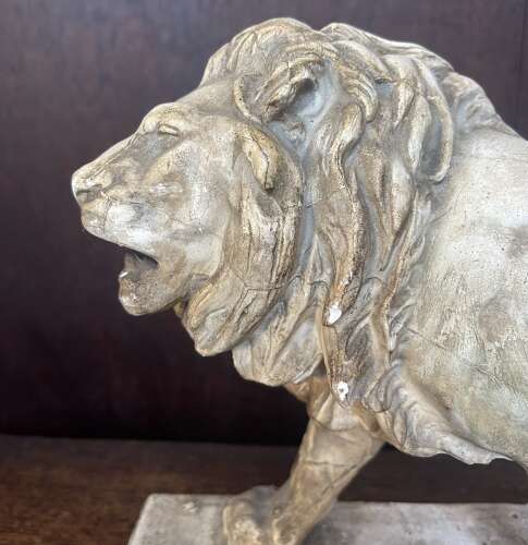 A 19th century plaster cast of the walking lion by Antoine-Louis Barye