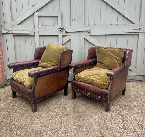 An Arts and Crafts studded leather 3 piece suite.