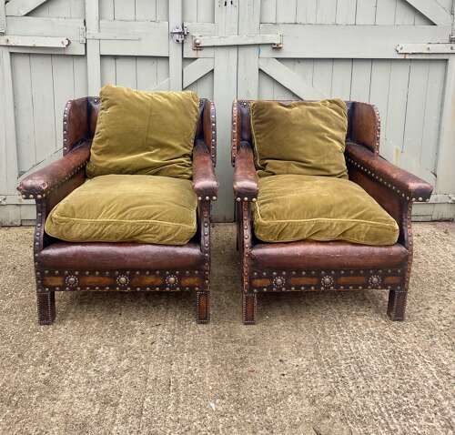 An Arts and Crafts studded leather 3 piece suite.
