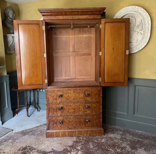 A 19th century burr walnut gentleman's wardrobe