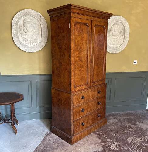 A 19th century burr walnut gentleman's wardrobe