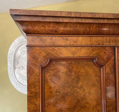 A 19th century burr walnut gentleman's wardrobe