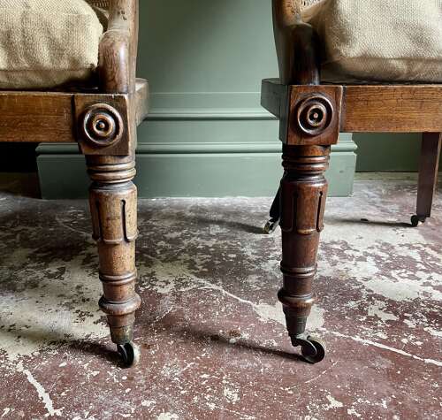 A pair of Regency bergere chairs