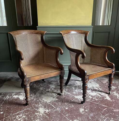 A pair of Regency bergere chairs