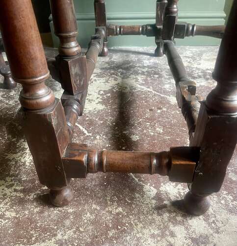 An 18th century yew wood gate leg table