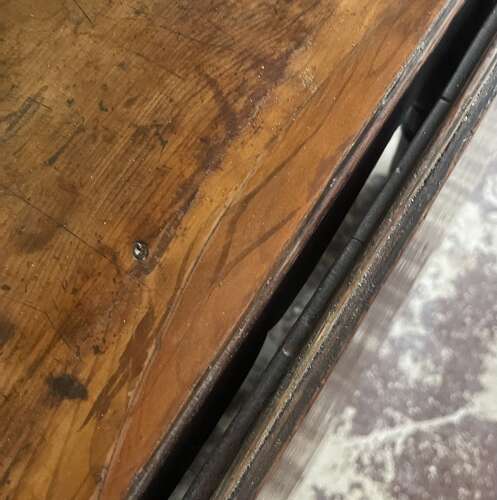 An 18th century yew wood gate leg table