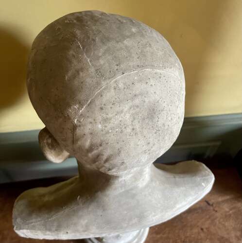 A 19th century bust of a Roman Patrician