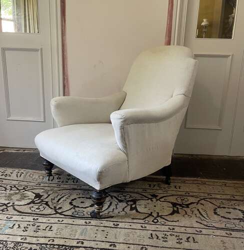 A 19th century armchair by Hampton and Sons .Pall Mall