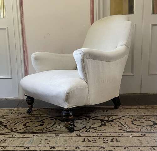A 19th century armchair by Hampton and Sons .Pall Mall
