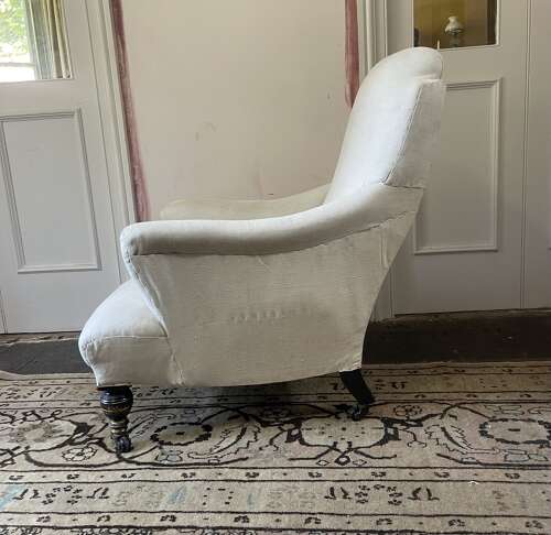 A 19th century armchair by Hampton and Sons .Pall Mall