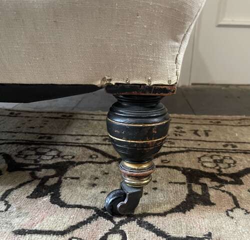 A 19th century armchair by Hampton and Sons .Pall Mall