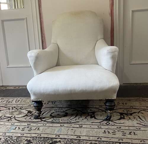 A 19th century armchair by Hampton and Sons .Pall Mall