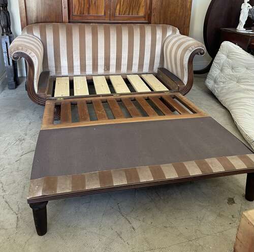 A rare Regency sofa bed