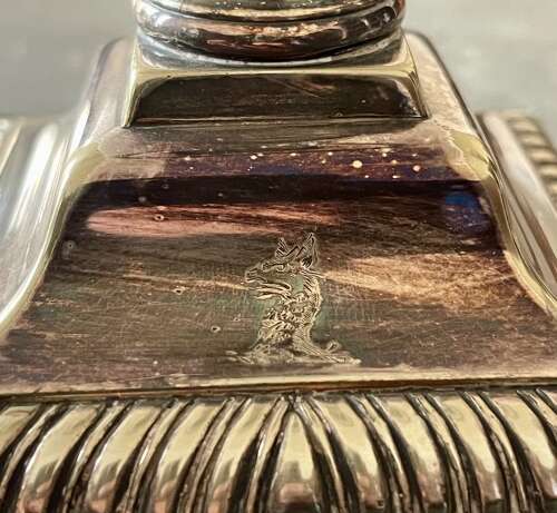 A set of four silver plate lamps by Hinks