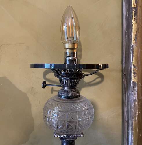 A set of four silver plate lamps by Hinks