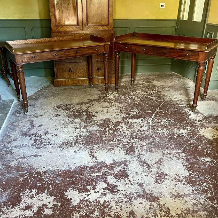 A matched pair of side tables attributed to Holland and sons